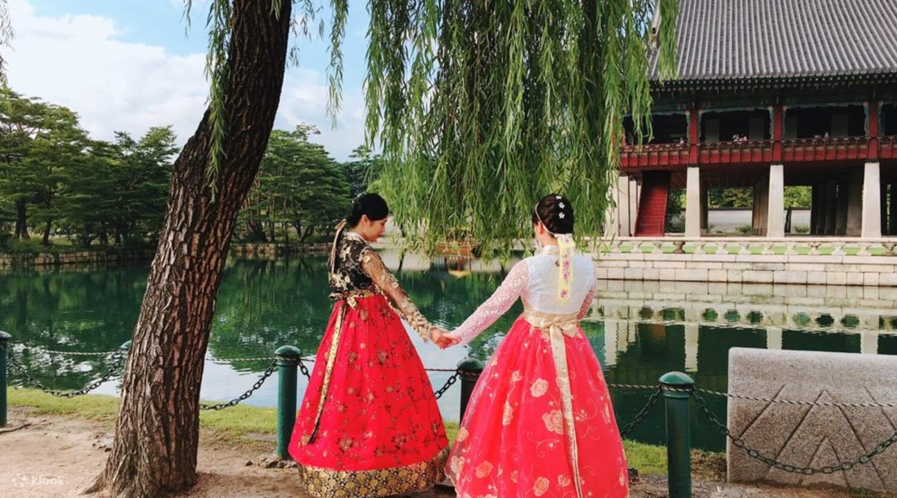 girls wearing hanboks in palace